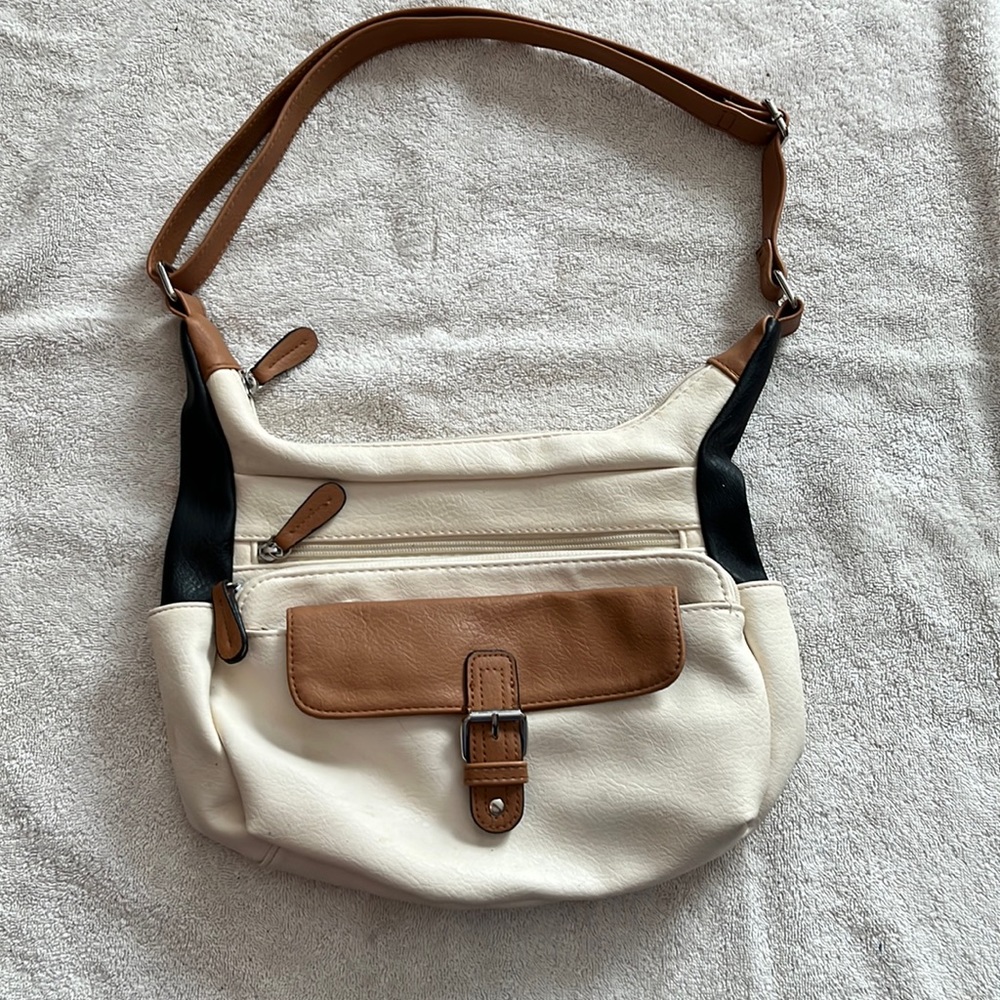 Cream, tan and black purse